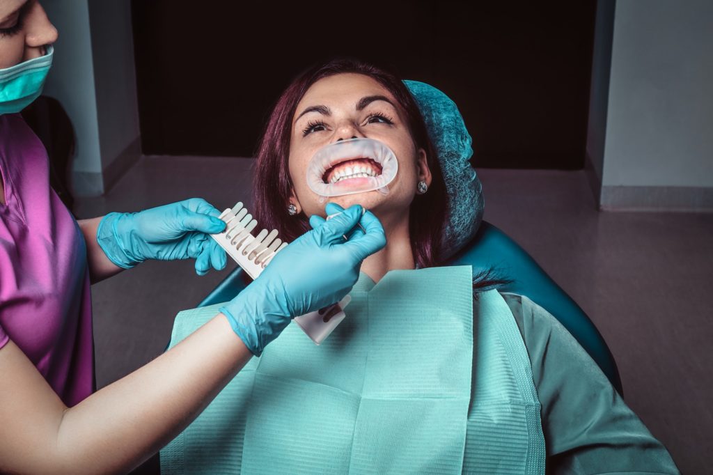 Child receiving safe teeth whitening treatment at Kids Smiles Pediatric Dentistry in St. Louis for a brighter smile.