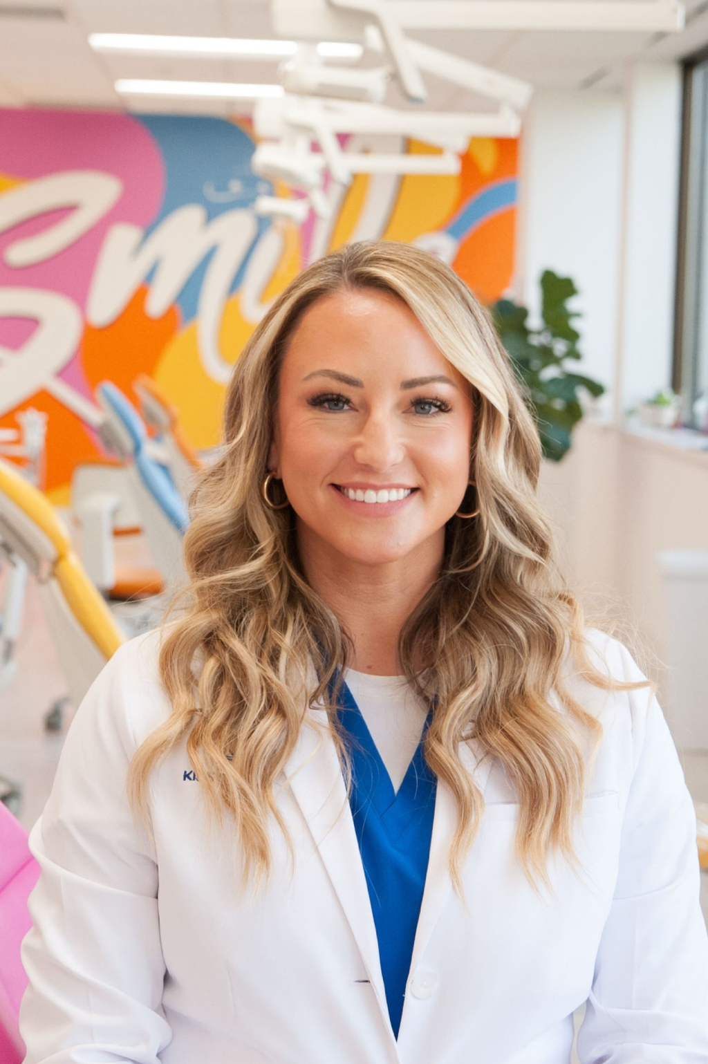 Professional headshot of Dr. Kelly Jobe, board-certified pediatric dentist at Kids Smiles in St. Louis, MO.