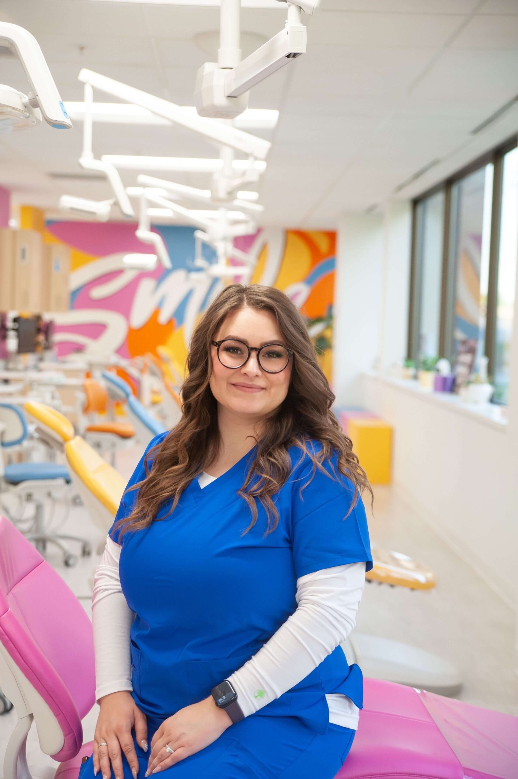 Fiona, patient care coordinator at Kids Smiles Pediatric Dentistry, assisting with scheduling and patient support.