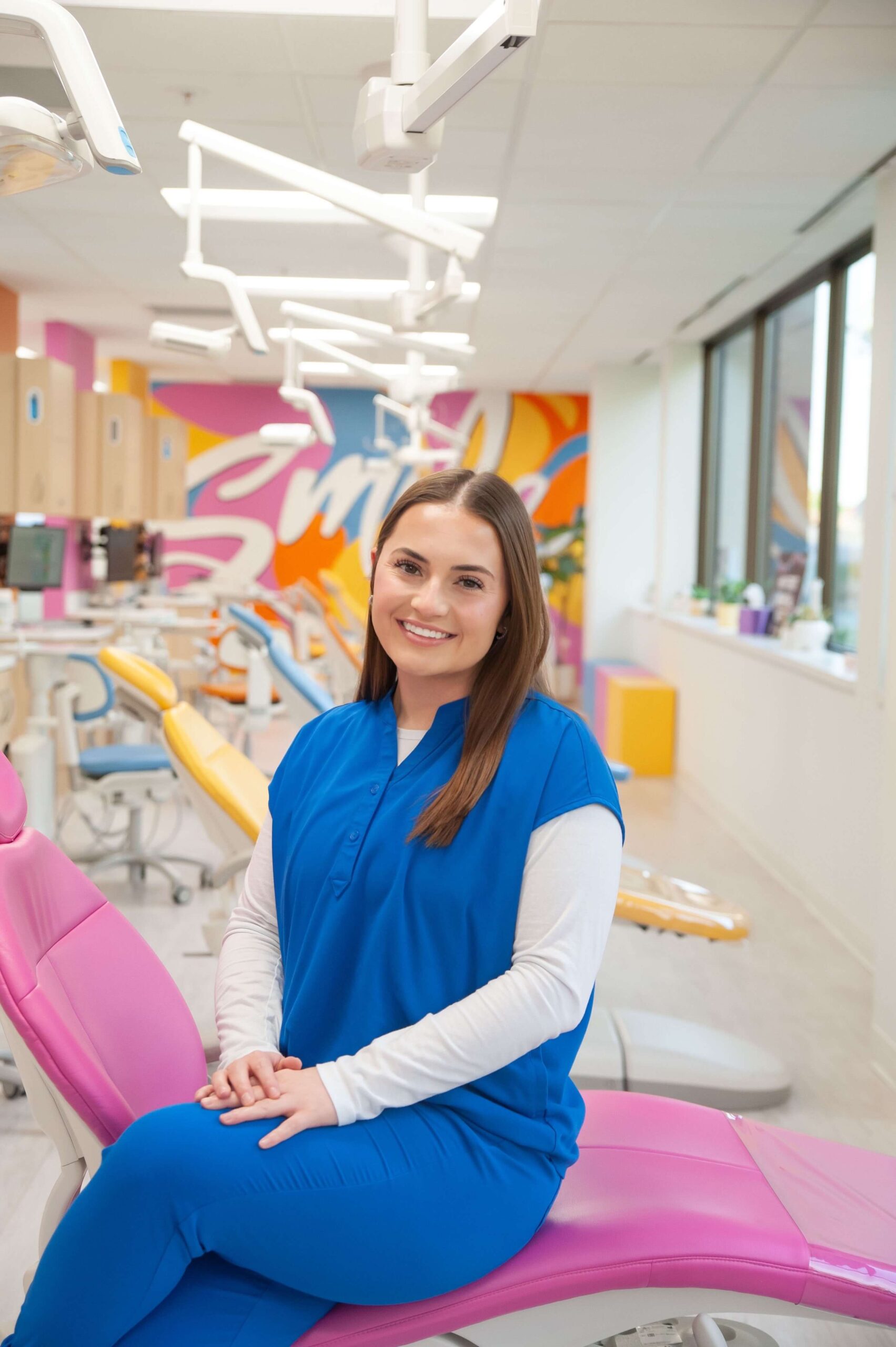 Malorey, new patient and care coordinator at Kids Smiles Pediatric Dentistry in St. Louis, welcoming children and families to the practice.