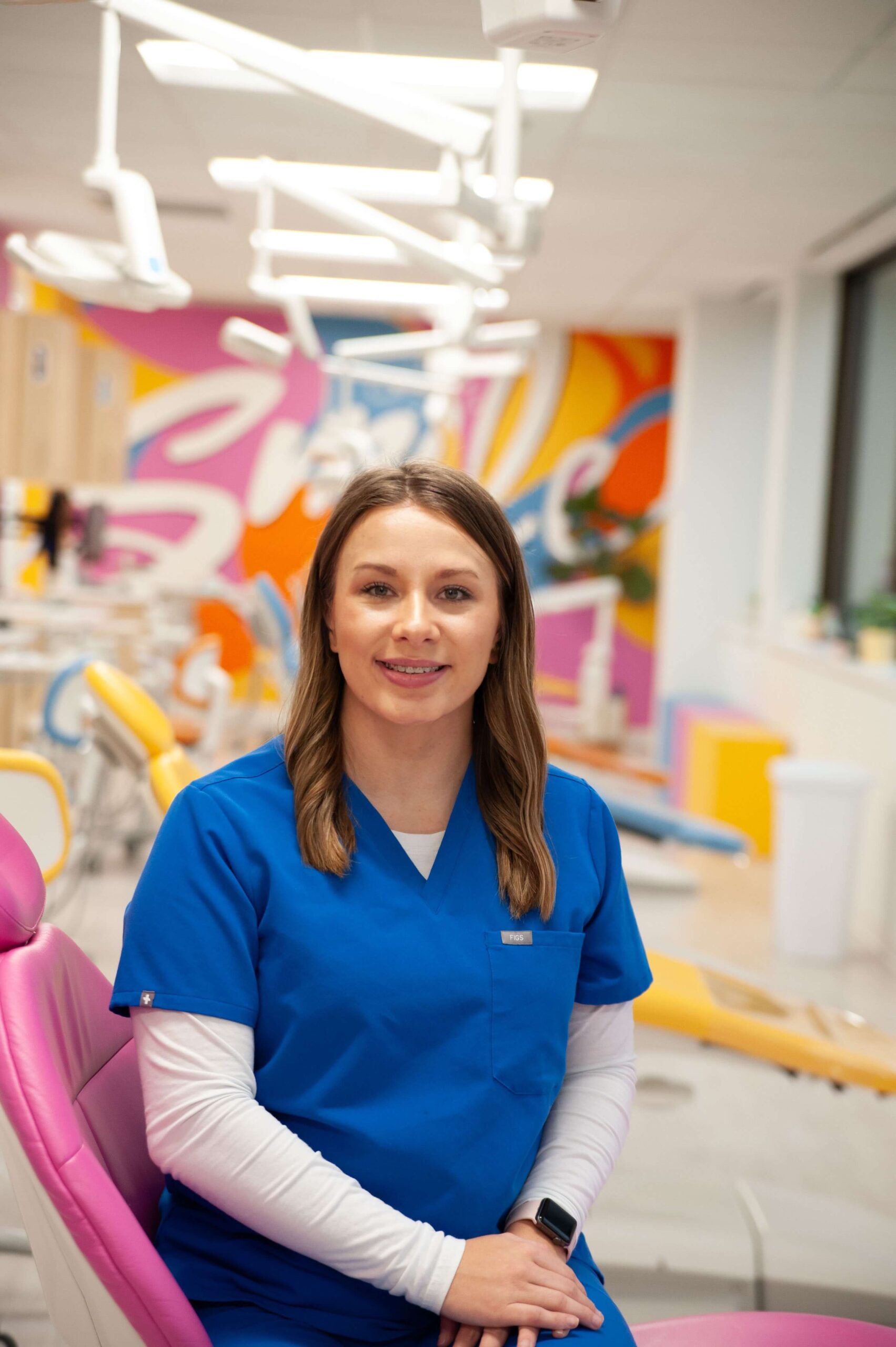 Olivia, dental assistant at Kids Smiles Pediatric Dentistry in St. Louis, MO, supporting gentle pediatric care.
